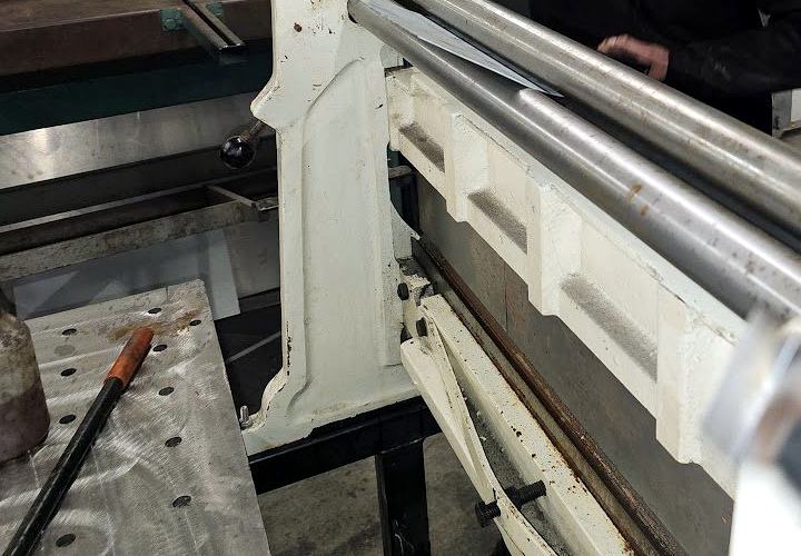 Rolling sheet metal in the fab bay